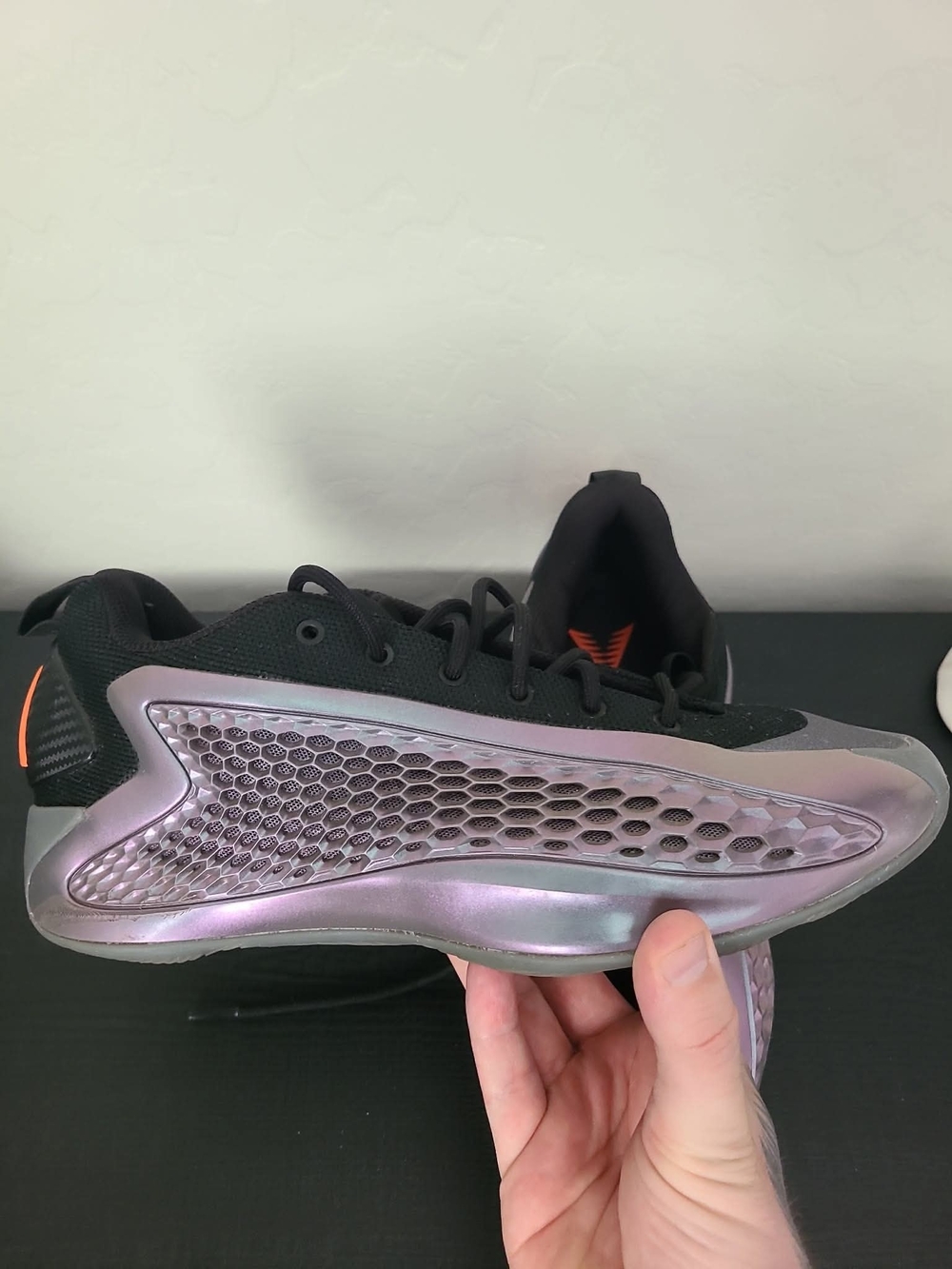adidas AE 1 Low 'Iron Sharpens Iron', featuring a striking iridescent metallic